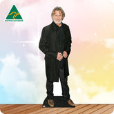 Cardboard cutout of a person wearing a black coat with 'Australian Made' logo in the corner.